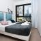 WealthyStays 2BR Retreat , 5Min Walk to Beach