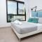 WealthyStays 2BR Retreat , 5Min Walk to Beach