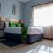 Downtown Oasis Suites - 利隆圭