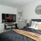 Guestly Homes - Modern Studio Apt