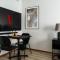 Guestly Homes - Modern Studio Apt