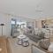 Stylish 4-Bed Waterfront Home with Private Pool