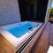 Jacuzzi and Pool Apartments