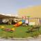 Family-Friendly Villa 1br with Play Area+Pool. UAE - Dubaj