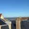 Mulberry duplex appartement bien équipé 2 chambres petite vue sur mer plein centre d'Arromanches à 2 mn de la plage et près de Bayeux - 阿罗芒什莱班