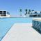 Castle Th16 Beachfront Townhouse with private patio, direct beach access, pool, tennis & free parking!
