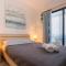 Large Veranda 2BR Walk to Beach