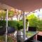 Large Veranda 2BR Walk to Beach