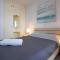 Large Veranda 2BR Walk to Beach