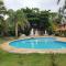 Casa Condomínio com 04 quartos, 200 metros da Praia de Manguinhos - 布希奥斯