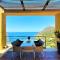 Beachfront Ravdoucha Epavlis Eleni Villa - Pool, Hot Tub, Gym, Sauna, Private Parking, WiFi