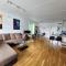 The Arctic Edge - Modern Seaside Apartment with Host in Central Tromsø