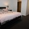 New Spacious 4 Bedroom Retreat fully air conditioned in Loganholme