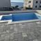 Sunshine Apartment Complex with a Pool by the Beach - Mandre, Pag - Mandre
