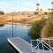 RIVERFRONT RUBY RED HOME WITH PRIVATE DOCK - Буллгед-Сіті