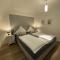 Ferienwohnung Ambiente II und III
