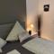 Ferienwohnung Ambiente II und III