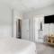 Modern Coastal Escape with Fire Pit & Pool Access - 因莱特海滩