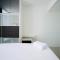 Spacious and Homey 2BR at The Via and The Vue Apartment By Travelio