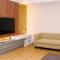 1BR Spacious Combine Unit at Vasanta Innopark Apartment By Travelio