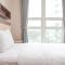 2BR Citralake Suites 2nd Floor Comfy Easy Access Apartment By Travelio