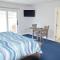 Rheas Inn by the Sea