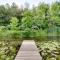 Waterfront Wahkon Home with Wraparound Deck and Docks