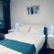 1BR-1BR-1Car-Sleeps 4-Pool-CBD