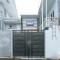 RedDoorz Premium at THE GRAND PENINSULA SUITES