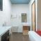 RedDoorz Premium at THE GRAND PENINSULA SUITES