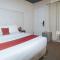 RedDoorz Premium at THE GRAND PENINSULA SUITES