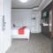 RedDoorz Premium at THE GRAND PENINSULA SUITES