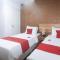 RedDoorz Premium at THE GRAND PENINSULA SUITES
