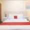 RedDoorz Premium at THE GRAND PENINSULA SUITES