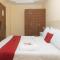 RedDoorz Premium at THE GRAND PENINSULA SUITES