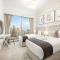 SML Vacation Homes - Sky High Apartments with Burj Khalifa and Dubai Fountain Views at Grande Signature, Downtown Dubai