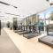 SML Vacation Homes - Sky High Apartments with Burj Khalifa and Dubai Fountain Views at Grande Signature, Downtown Dubai