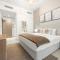 SML Vacation Homes - Sky High Apartments with Burj Khalifa and Dubai Fountain Views at Grande Signature, Downtown Dubai
