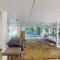 3rd-row beach cottage with ocean views, beach access, deck, & grill