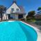 Maison spacieuse avec piscine