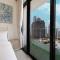 Tick - 2BR Apartment with Balcony in Azizi riviera