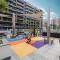 Tick - 2BR Apartment with Balcony in Azizi riviera