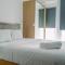 Stunning and Comfy Studio Amazana Serpong Apartment By Travelio - Tangerang