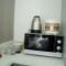 Nice Studio Apartment at Aeropolis Residence near CGK Airport By Travelio