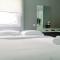 Nice Studio Apartment at Aeropolis Residence near CGK Airport By Travelio