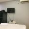 Tranquil Living Studio at Belmont Residence Puri Apartment By Travelio