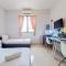 Warm and Cozy Studio (No Kitchen) at Kubikahomy Apartment By Travelio - Tangerang