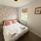 East Bay Cottage - Part of the The Bay Filey Holiday Village with pool, gym and direct beach access, pub, restaurant, tennis and meadows walks