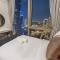 SML Vacation Homes - Sky High Apartments with Burj Khalifa and Dubai Fountain Views at Grande Signature, Downtown Dubai