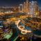 SML Vacation Homes - Sky High Apartments with Burj Khalifa and Dubai Fountain Views at Grande Signature, Downtown Dubai
